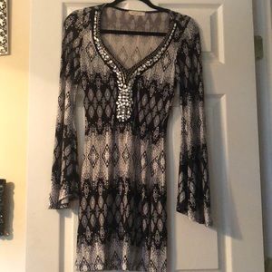 Dress, patterned with gem stones around neck line